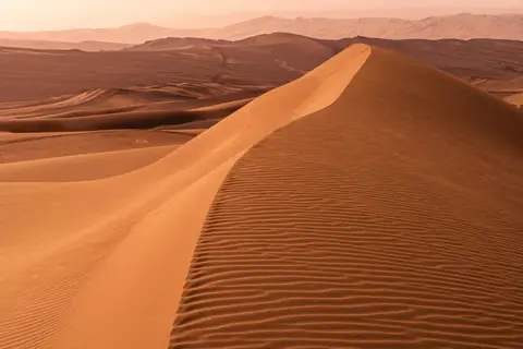 Before: Camel caravan added to the dunes