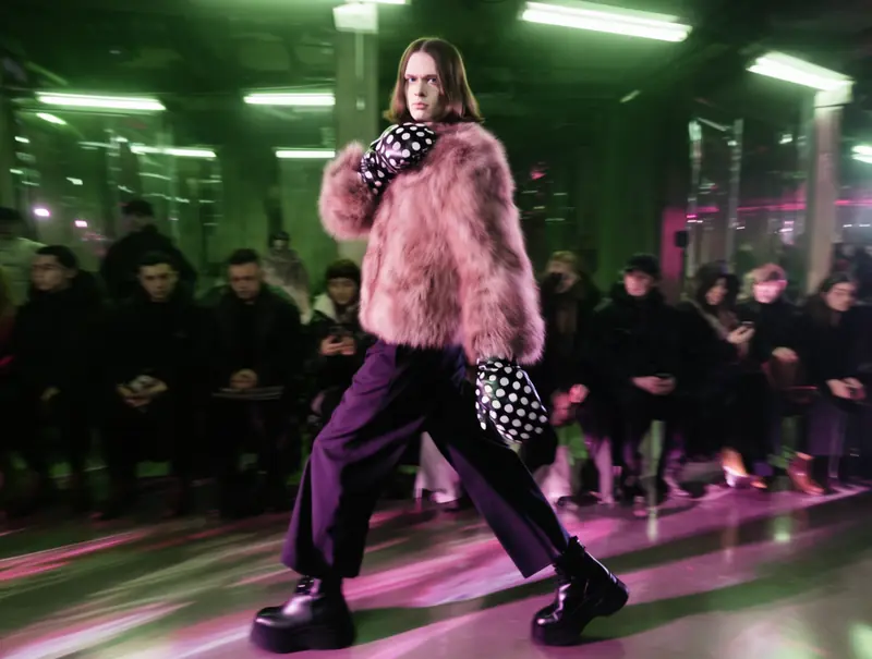 Krea 2 Large: Runway walk, looking back at the camera
